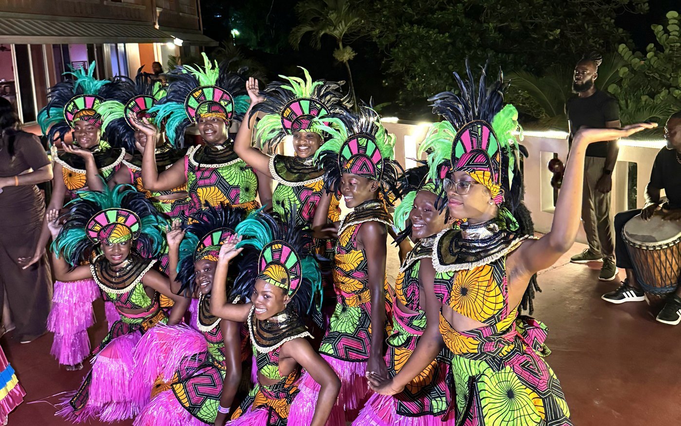 Costumed dancers performing at the hotel in the evening