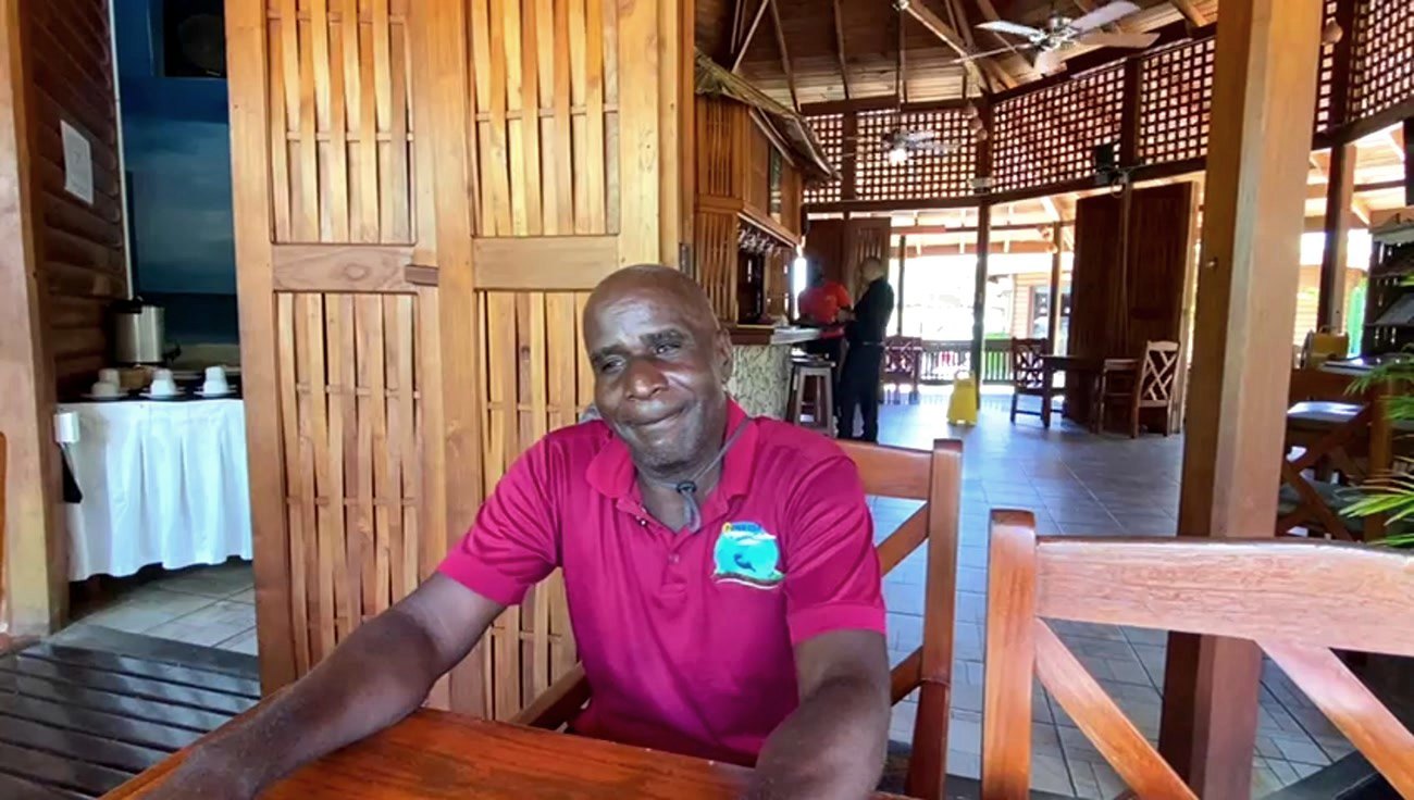 A local naturalist welcoming guests on the terrace